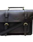 Black leather satchel bag with gold accents on a white background