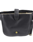 Black leather handbag with a gold button on a white background