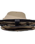 Beige hat with a black interior lining on a white background
