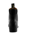 Black leather boot with a brand label on a white background