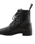 Black leather boot with laces on a white background