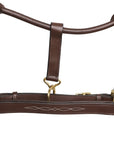 Brown leather horse halter with gold hardware on a white background
