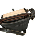 Black leather bag with a wooden interior on a white background