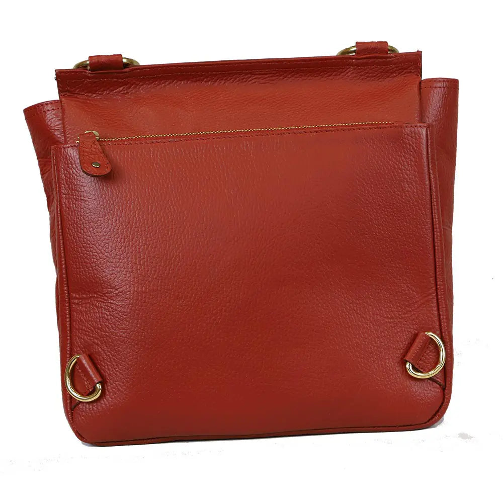 Red leather handbag with gold accents on a white background