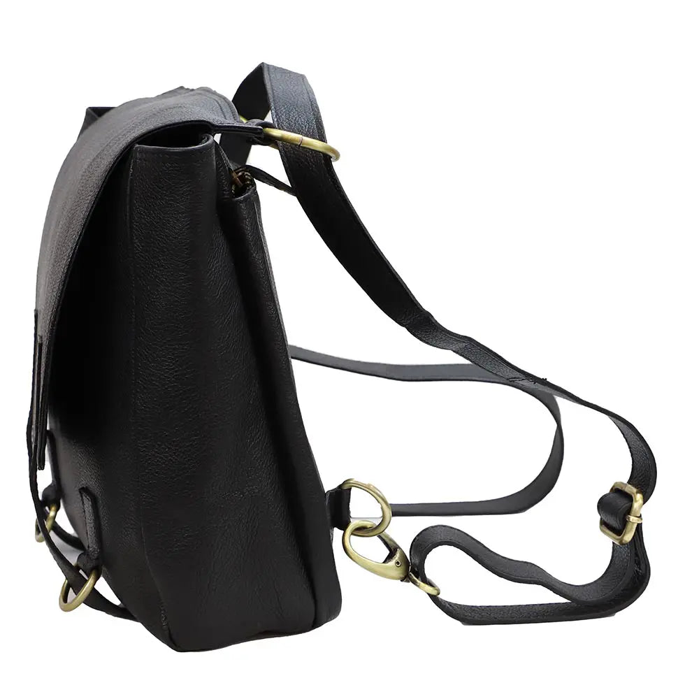 Black leather backpack with gold hardware on a white background