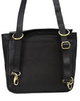Black leather handbag with gold hardware on a white background