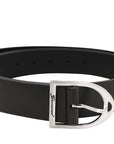Black belt with silver buckle on a white background