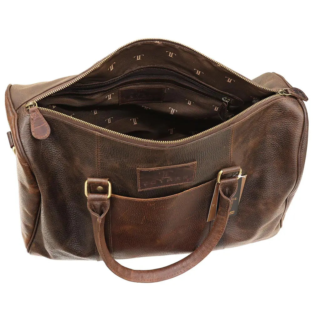 Brown leather duffel bag with gold buckles on a white background