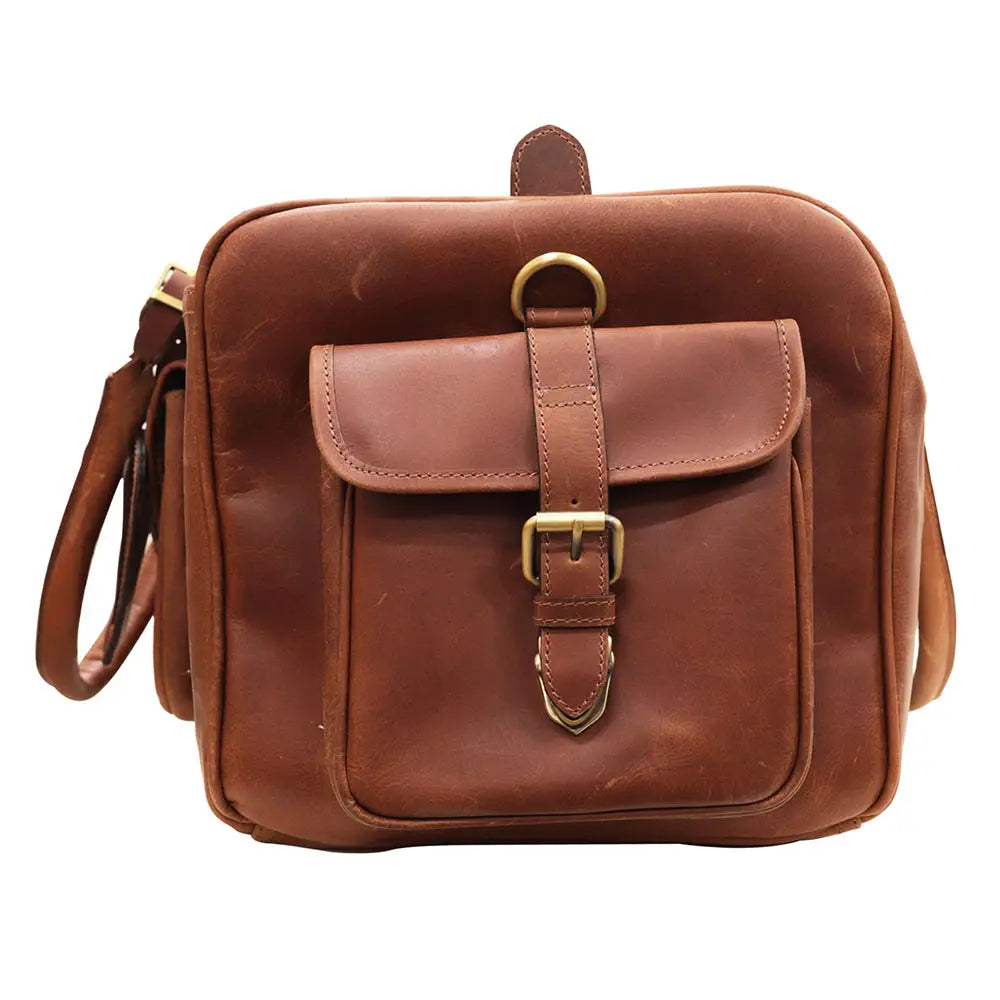 Brown leather bag with a buckle on a white background
