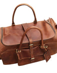 Brown leather duffel bag on a white background