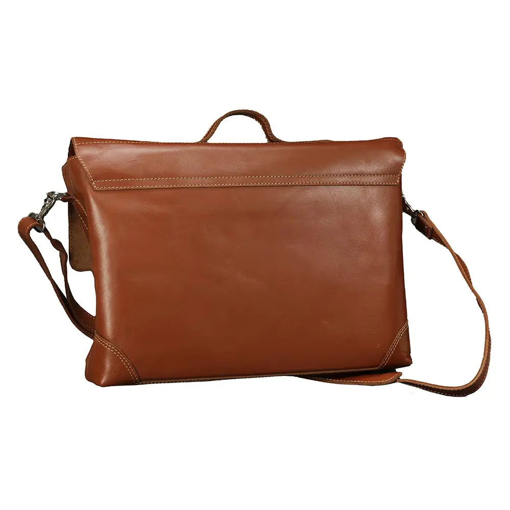Brown leather bag with shoulder strap on a white background