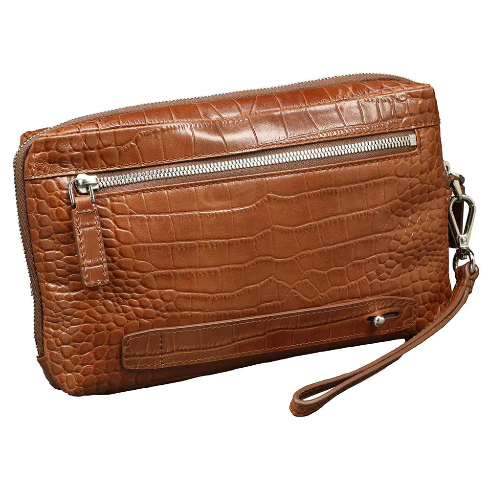 Brown crocodile-patterned clutch bag with a wrist strap on a white background