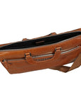 Brown leather bag with multiple zippers on a white background