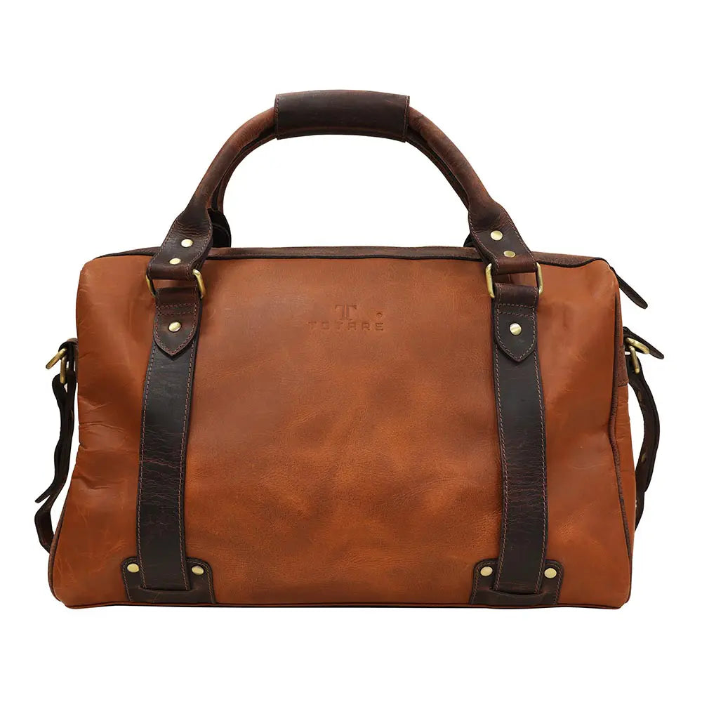 Brown leather duffel bag with black straps on a white background