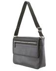 Gray shoulder bag with a strap on a white background