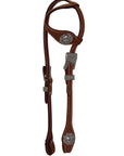 Brown leather horse bridle with silver hardware on a white background