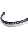 Black headband with purple and clear gemstones on a white background