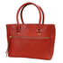 Red leather handbag with gold accents on a white background
