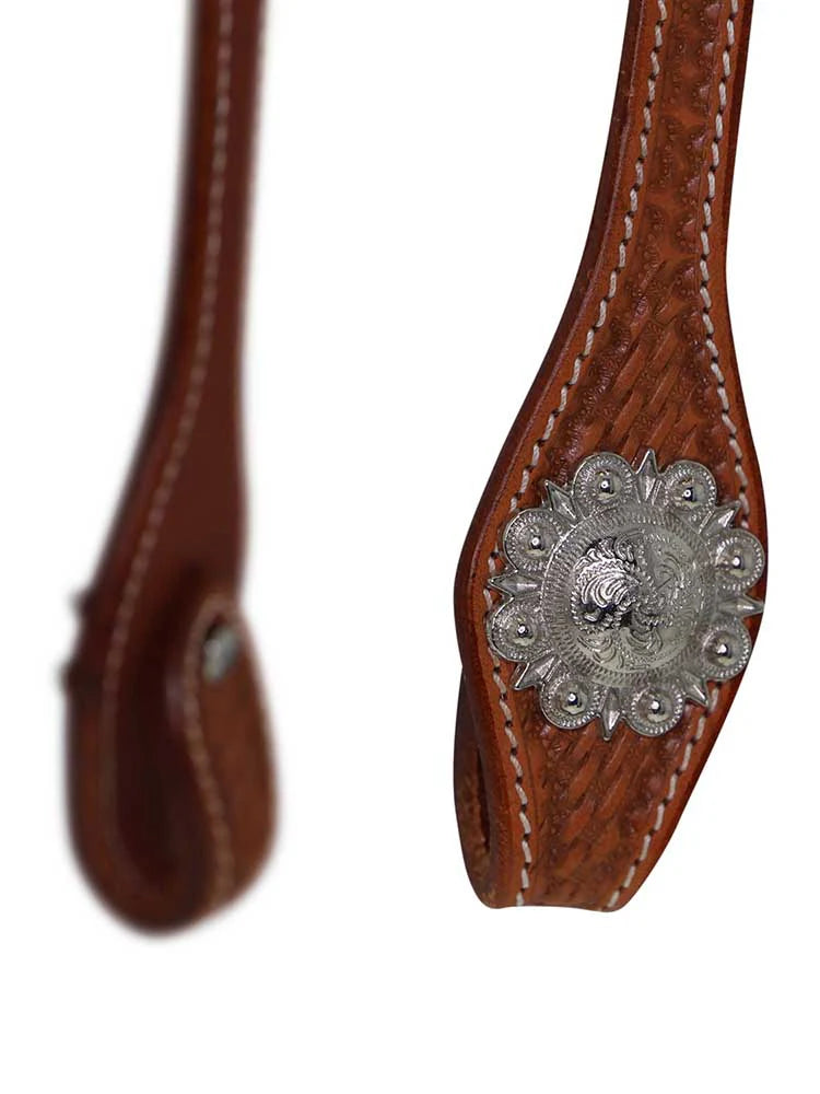 Brown leather bridle bit with silver concho on a white background