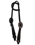Black leather bridle with decorative conchos on a white background