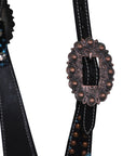 Black leather strap with decorative brown buckle on a white background