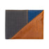 Multicolored wallet with gray, blue, and brown sections on a white background